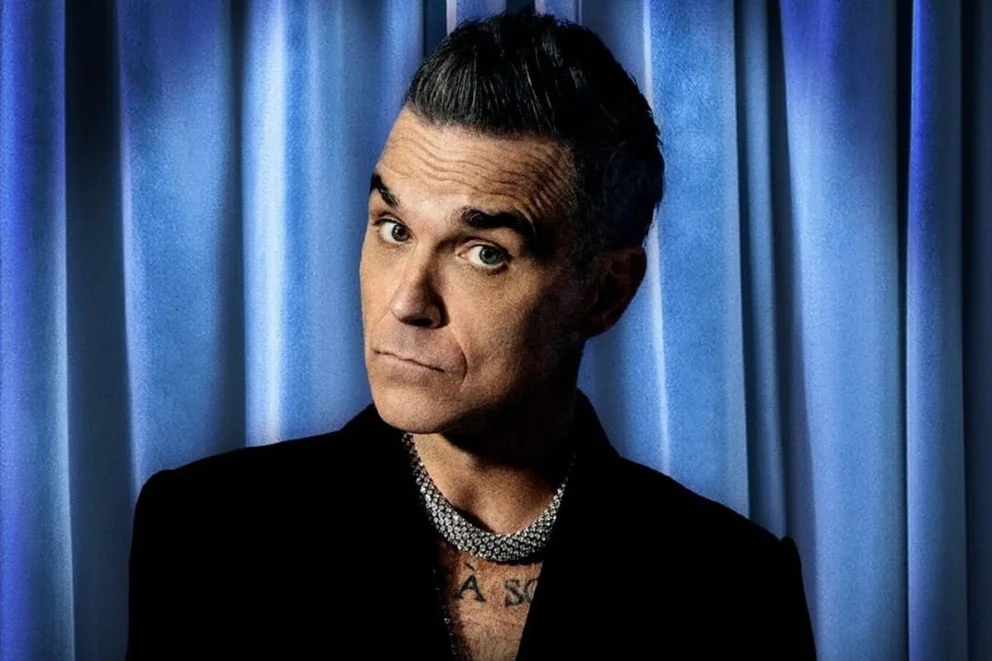Robbie Williams llega a la Argentina tras alcanzar el récord de 16 álbumes número uno en su país natal.
