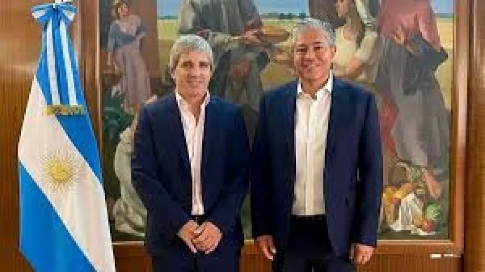 Luis Caputo y Rolando Figueroa.
