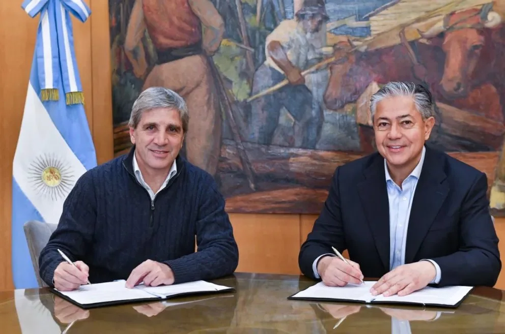 Luis Caputo y Rolando Figueroa.
